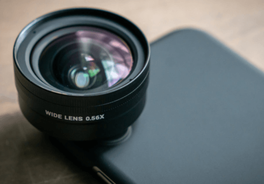 What is a telephoto lens used for?